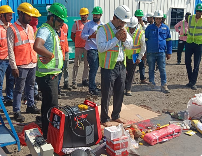Construction site team wearing safety helmets and high-visibility workwear